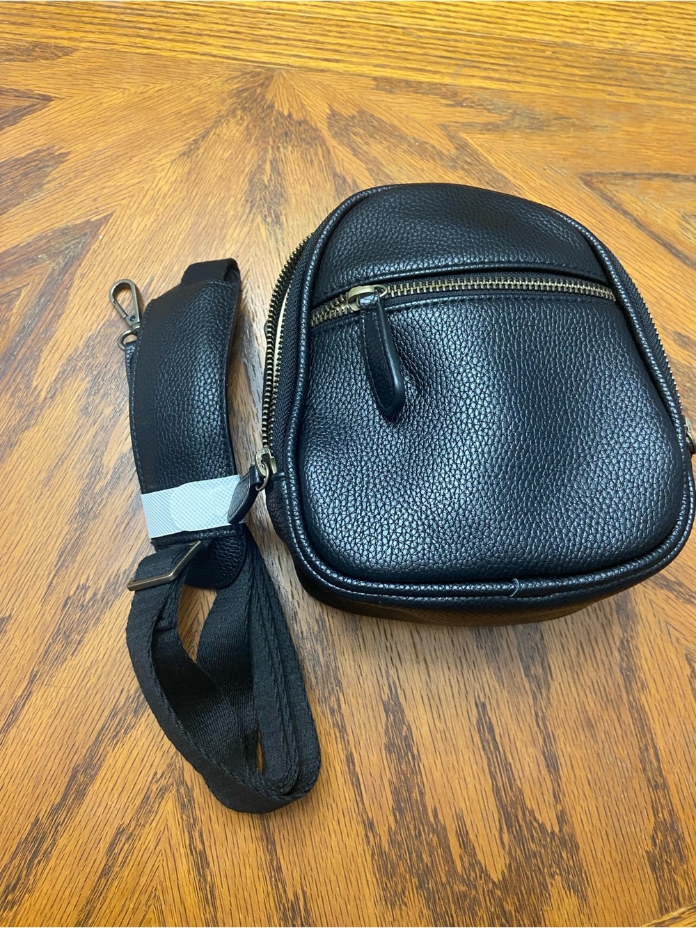 Divvia black vegan leather camera sling bag